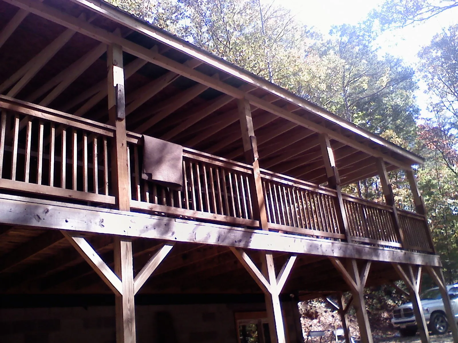 Timber framing under a new elevated porch and deck — Roof Leak Repair in Bow by Roofing Brothers